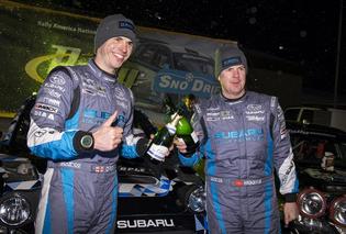 David Higgins and Craig Drew of Subaru Rally Team USA claim victory at Sno*Drift Rally. David Higgins and Craig Drew of Subaru Rally Team USA claim victory at Sno*Drift Rally.