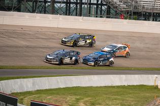 Chris Atkinson at the front of the pack in his Subaru STI. Chris Atkinson at the front of the pack in his Subaru STI.