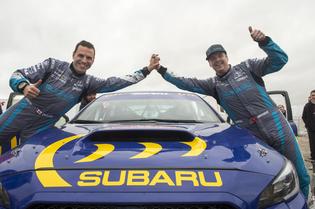David Higgins and Craig Drew celebrate a strong result at Wales Rally GB. David Higgins and Craig Drew celebrate a strong result at Wales Rally GB.