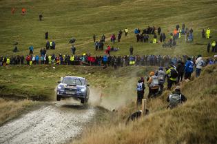 Rally fans endured heavy rain and winds to catch a glimpse of Higgins and Drew at Wales Rally GB. Rally fans endured heavy rain and winds to catch a glimpse of Higgins and Drew at Wales Rally GB.